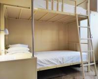 Кровать в общем женском номере с 4-мя двухъярусными кроватями (удобства общие) (мансарда)