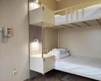 Кровать в общем мужском номере с 3-мя двухъярусными кроватями (удобства общие) (мансарда)