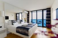 Двухместный люкс с балконом и с видом на море двуспальная кровать